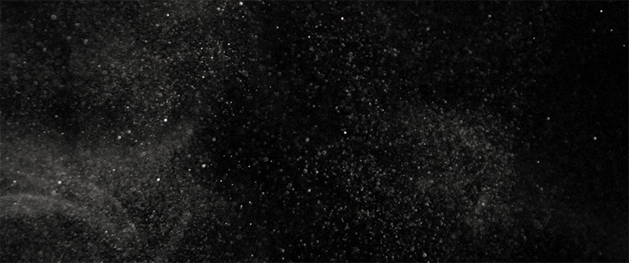 Black background with dust particles