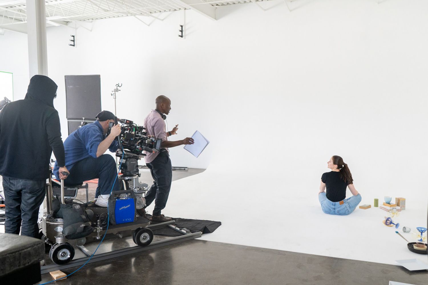 The director talks to the actress while filming NIHIL